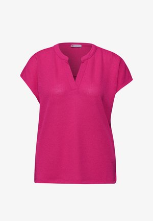 Helder roze gebreide top met korte mouwen, V-hals en losse pasvorm, ontworpen voor casual gebruik.