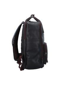 Zaino in pelle marrone scuro con un design strutturato, numerose tasche e spallacci regolabili. Presenta una superficie liscia e cerniere solide.