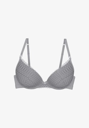 Grijze kanten beha met een diepe halslijn, gepadde cups en decoratieve afwerking. Verstelbare bandjes en een haaksluiting aan de achterkant.