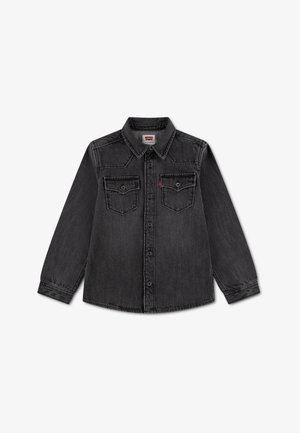 Chemise en denim noire à manches longues avec fermeture à boutons sur le devant, deux poches poitrine à rabat, col classique et étiquette rouge Levi's visible sur la poche gauche.