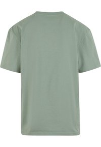 Gray-green short-sleeve t-shirt with a crew neck, featuring a soft cotton texture and a relaxed fit, no patterns or embellishments.