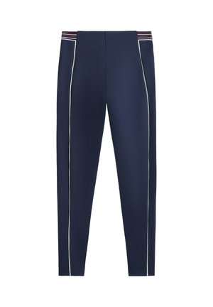 Pantalon de sport bleu marine avec une coupe ajustée, arborant des bandes blanches sur les côtés et une taille multicolore à rayures. Texture lisse et matériau extensible.