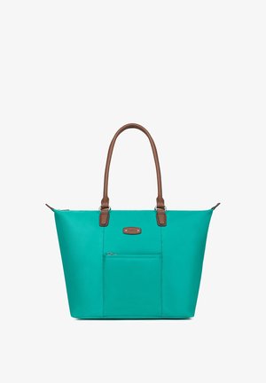 Sac cabas turquoise avec poignées en cuir marron, poche avant zippée, et écusson rectangulaire de la marque au-dessus de la poche.