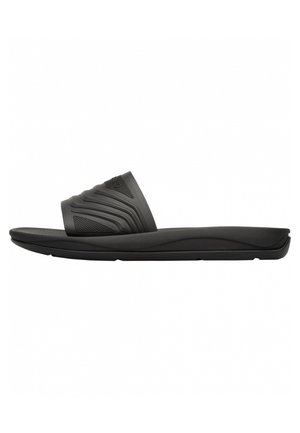 Black slide sandals with a textured strap featuring wave patterns. Soft rubber material and a contoured sole for comfort.