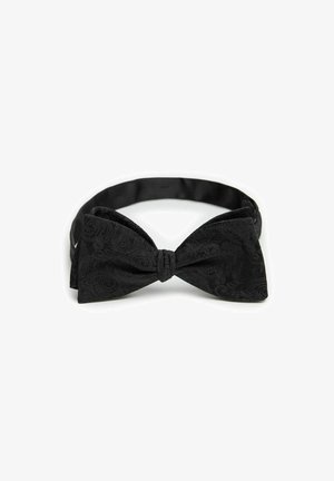 Sort butterfly-slips lavet af struktureret stof med et paisley-mønster. Den har et glat rem til sikker fastgørelse.