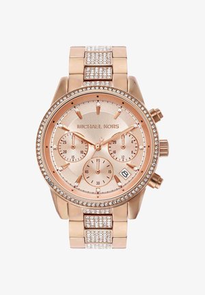 Montre Michael Kors en or rose avec accents en cristal, trois sous-cadrans, guichet de date à 4 heures et bracelet à maillons avec cristaux.