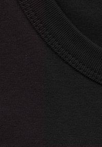 Black knit fabric with a smooth texture and a ribbed collar. The material is even in color, displaying a slight sheen in certain light.