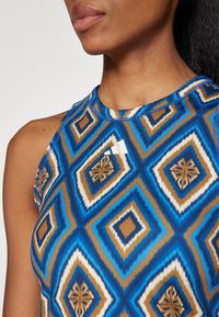 adidas Performance ADIDAS FARM RIO TANK - Top - night indigo/dark marine/cream white