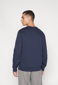 Champion GRAPHIC CREWNECK - Sudadera - dark blue