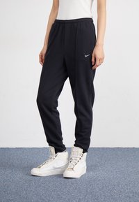 Nike Sportswear Tracksuit bottoms - black