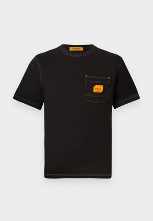 Black cotton t-shirt with a crew neck, short sleeves, and a front pocket featuring an orange label and contrasting stitching details.