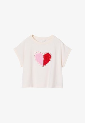 Cream short-sleeve toddler T-shirt with reversible sequined heart in pink and red, outlined by small red "LOVE" text repeated around the heart.