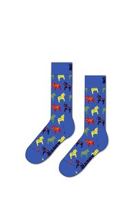 Barevné ponožky s modrým pozadím a opakujícím se vzorem koní v červené, žluté, zelené a fialové barvě. Bavlněný materiál, délka po kolena.