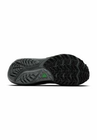 Sole of a hiking shoe, featuring a textured black rubber surface with gray traction lugs and a green triangle logo near the heel.