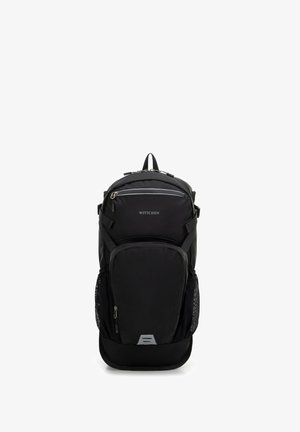 Zaino in tessuto nero con un design elegante, spallacci imbottiti, tasca frontale con zip e tasche laterali in rete; presenta dettagli in metallo argentato.