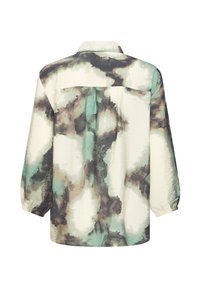 Chemise boutonnée à manches longues avec poignets élastiques, présentant un motif style aquarelle en tons crème, sarcelle, marron et noir, vue de dos.