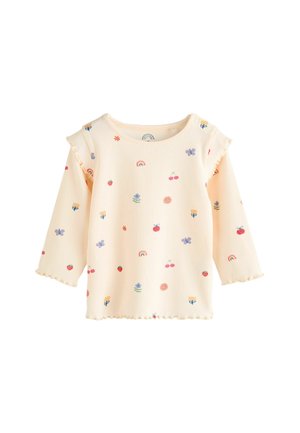 Helles Pfirsichfarbenes Langarmshirt mit gerippter Struktur, das verschiedene farbenfrohe Muster wie Blumen, Früchte und Regenbögen zeigt, mit Rüschendetails an den Schultern.