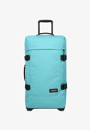 Bolsa de viaje con ruedas color turquesa, con asa retráctil, correas laterales ajustables y detalles en negro. Tejido duradero y forma rectangular.