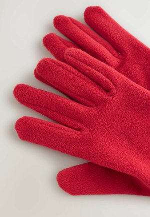 Mânuși din fleece roșu cu o textură moale, dotate cu cinci degete elongate și o finisare netedă. Fără accesorii vizibile sau modele.