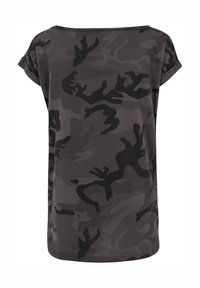 Dark gray short-sleeve T-shirt with black and gray abstract camouflage pattern, rolled cuffs, and a wide round neckline.
