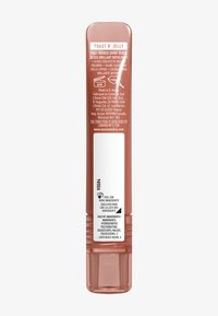 Tube de gloss à lèvres NYX Toast N' Jelly à brillance intense, avec détails des ingrédients et de fabrication sur l'étiquette arrière, teinte nude pêchée.