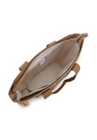 Tan fabric handbag with a lined interior, zip closure, and two sturdy handles. Features a small zipper pocket and brand label inside.