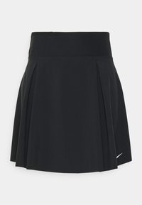 Mustassa laskostetussa urheiluhameessa on leveä vyötärönauha ja pieni valkoinen Nike-logomerkki helman lähellä oikealla puolella.