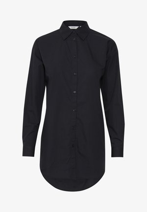 Črna majica z dolgimi rokavi iz bombaža, z gumbom spredaj, koničastim ovratnikom in zaobljenim robom. Gladka površina brez vzorcev.