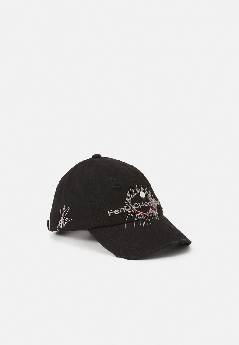 Black cotton baseball cap with embroidered logo, textured accents, curved brim, and distressed detailing. Features adjustable strap at the back.