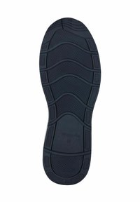 Czarna gumowa podeszwa buta z teksturowaną powierzchnią z rowkami i wzorami zapewniającymi przyczepność, oznaczona tłoczonym napisem "Tomaris 42".