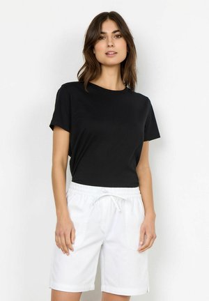 Black cotton short-sleeve t-shirt paired with white elastic-waist shorts. The shorts feature two side pockets and a drawstring.