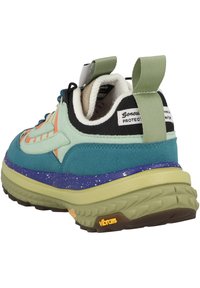Multicolored sneaker with teal, mint, and orange suede, textured sole, padded collar, and speckled midsole. Branding on back and tongue.
