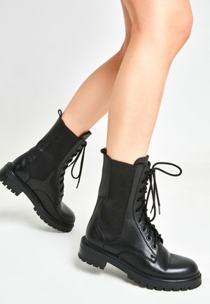 Platform ankle boots - black