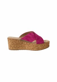 Fuchsia suede slide sandal with a cork wedge sole, featuring a cross-over upper design and a textured platform for added stability.
