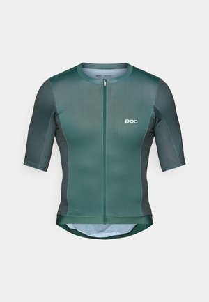 Rövid ujjú kerékpáros mez sötétzöld anyagból, sima textúrával, elöl cipzárral és fehér logóval a mellkason.