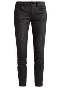 Pantalon noir en cuir coupe slim avec des détails côtelés sur les cuisses, poches avant, passants de ceinture et fermetures éclair aux chevilles.