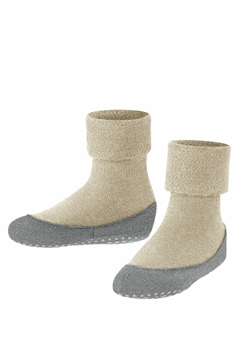 Calze lavorate a maglia beige con risvolto, suola grigia imbottita e puntini in gomma testurizzati per una migliore presa. Tessuto morbido con un aspetto liscio e accogliente.