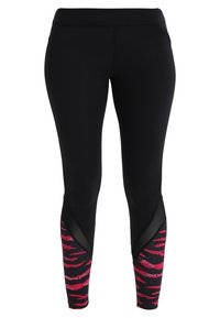 Leggings neri con motivo a strisce di tigre rosa sulla parte inferiore delle gambe, dotati di accenti in rete e di un design aderente. Realizzati in materiale elastico.