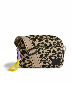 Small rectangular crossbody bag with beige and black leopard print, adjustable beige strap, and yellow coiled keychain attached.