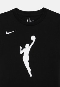 Black cotton T-shirt featuring a white silhouette of a player shooting a basketball, with a white Nike logo above the silhouette.