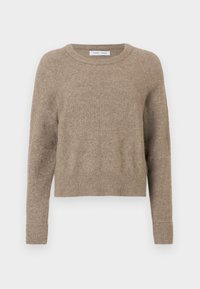 Pull beige à manches longues en maille avec poignets et ourlet côtelés, col rond et tissu doux texturé.