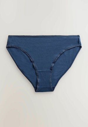 Bañadores de algodón en color navy con una textura suave, cinturilla elástica y detalles cosidos en los bordes, con un diseño de corte clásico.