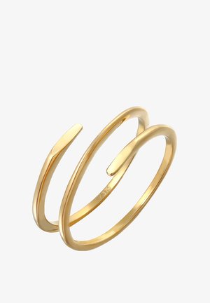Anello in oro con un design aperto e minimalista; presenta curve lisce e arrotondate e due estremità affusolate. Contrassegnato con 375 per la purezza dell'oro.