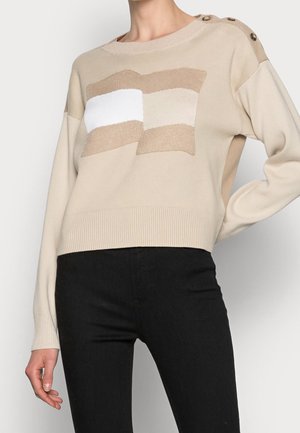 Stickad tröja - beige