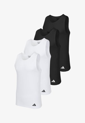Quatre débardeurs de sport sans manches : deux blancs et deux noirs, fabriqués en tissu lisse avec un col rond et le logo Adidas en bas de l'ourlet.