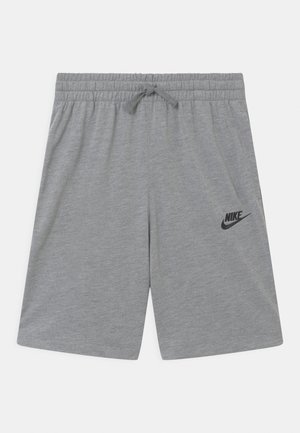 Pantalones cortos deportivos grises hechos de una tela suave. Presentan una cinturilla elástica con cordón y un pequeño logo negro de Nike en el costado.