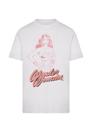 White T-shirt featuring a pink sketch of Wonder Woman with hands on hips and pink "Wonder Woman" text below the figure.