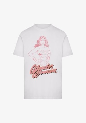 White T-shirt featuring a pink sketch of Wonder Woman with hands on hips and pink "Wonder Woman" text below the figure.