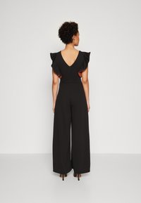 WAL G. PIP RUFFLE - Combinaison - black/burnt orange