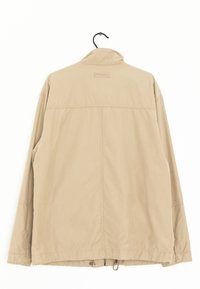 Giacca leggera beige con maniche lunghe, colletto alto, orlo con cordoncino e dettagli di cucitura sottili. Tessuto piacevolmente strutturato e liscio.